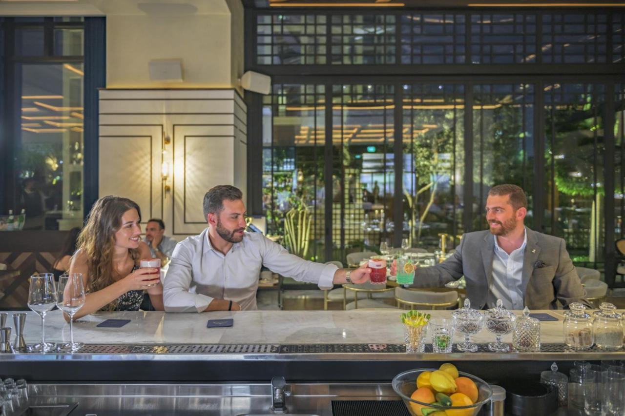 โรงแรมแกรนด์ ไฮแอท อัมมัน อัมมาน ภายนอก รูปภาพ The bar at the hotel